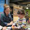 CU Boulder student Kathryn Flint, left, at the Children's Museum of Denver