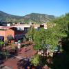 Pearl Street in Boulder with the Flatirons in the background