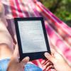 A person reading a book on an e-reader