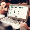 Person browses internet on laptop