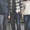 Group of young, diverse people stand side-by-side