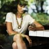 Woman looks at smartphone