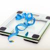 Bathroom scale and tape measurer