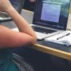 Person working at a laptop computer
