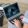 Person using Creative Cloud on a laptop