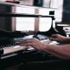 Hands playing piano