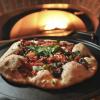 pizza coming out of the oven in the C4C