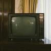 Analog TV in a retro 1970s style living room