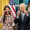 Joe Biden and Olivia Rodrigo removing sunglasses in the Oval Office