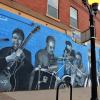 ‘Pueblo Musicians’ by Anthony Armijo on the wall of the Klamm Shell in Pueblo, Colorado