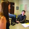 Student talks with residence hall advisor
