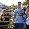 Buffs fans standing next to Ralphie the Buffalo