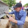 Provost Russ Moore signing Ramaley beam
