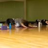 employees participate in a yoga class
