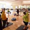 Students participate in fitness class at The Rec Center