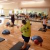 Students work out during fitness class at The Rec