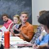 Student asks question during religious studies course