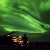 Roman Zavada performs live to lasers and footage of the Aurora Borealis in Northern Canada at Fiske Planetarium. Photo by Glenn Asakawa.
