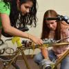 Maithreyi Gopalakrishnan and her colleague look at a rickshaw technology.