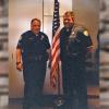 Detective Tim DeLaria and Sergeant Matt DeLaria at his police academy graduation in 1999