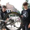 A campus community member gets help at a campus bike station.