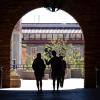 People walk through a tunnel on the CU Boulder campus