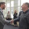 Daniel Salvetti greets Colorado Governor Jared Polis