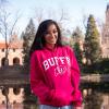 Serene Singh in front of Varsity Lake on campus
