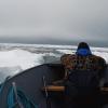 Researcher in boat on the Bering Sea