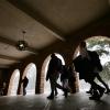 Campus community members walking on campus