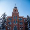 The Old Main building with a dusting of snow
