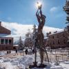 Sunlight peeks through the top of a statue near the UMC. (Photo by Patrick Campbell/University of Colorado)