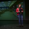 Presenter gives Ed Talk on stage