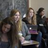 Students participate in classroom with blackboards