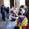 Students look at Spanish Heritage Language and Culture Day displays on campus