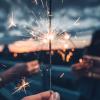 A person holding a sparkler