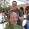 First-year ENVD student Nicole Elder donates her hair. Photo by Casey A. Cass.