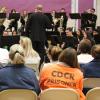 Larry Stoffel conducting a concert in front of those incarcerated in a state prison