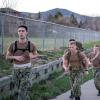 Midshipmen run from Folsom Stadium to Chautauqua Park as part of the sea trials exercise