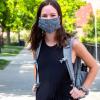 Student wearing a mask on campus