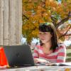 Student working at computer on campus