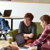 Students work together to study at a lounge on campus