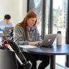 student studying on campus