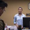 Student-employee works at front desk