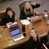 Four students studying at a table together
