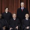 Nine Supreme Court justices pose for a photo