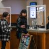 campus community members swiping their meal cards