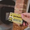 Person tapping their Buff OneCard for building access