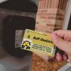 Person tapping their Buff OneCard for building access