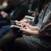 Audience members sit in chairs. (Photo by The Climate Reality Project on Unsplash)